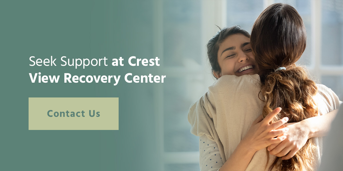 seek support at crest view recovery, woman hugging